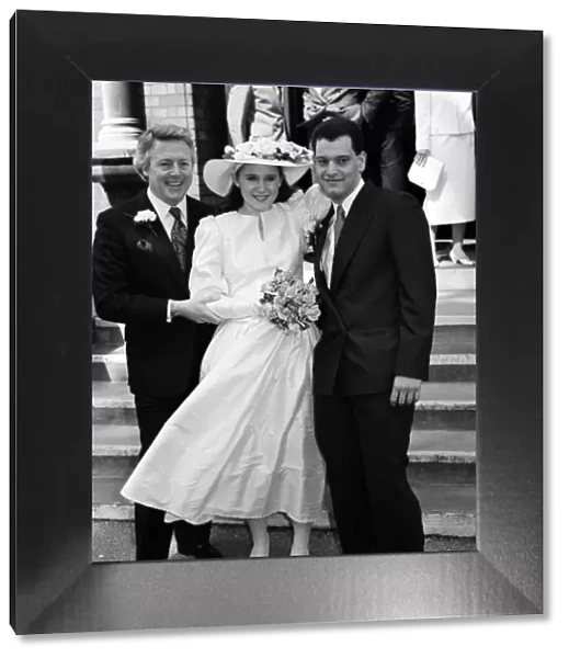 Jane Aspel, daughter of Michael Aspel (right), marries Andrew Boucher. 10th April 1987