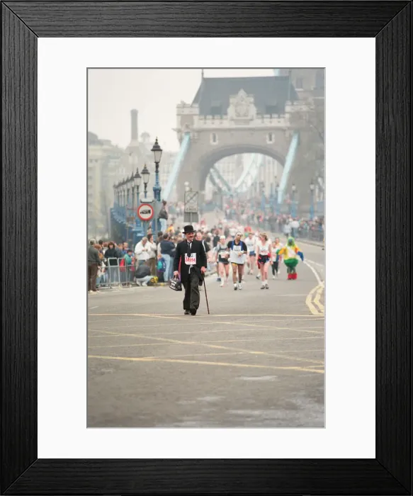 Framed Print : The London Marathon - 1990 Runners pass through and around the Tower Bridge area Framed Print : The London Marathon - 1990 Runners pass through and around the Tower Bridge area