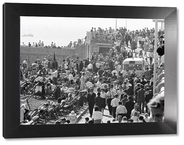 Mods v Rockers - Battle for Brighton. A calm but bust scene on Brighton