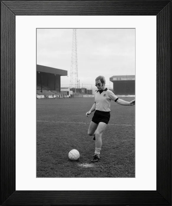 Framed Print : Elton John, just back from a tour of America, wants to be a director of Watford FC