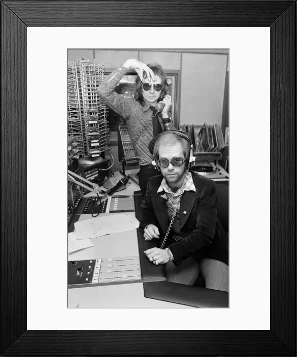 Framed Print : Elton John makes a whistle-stop visit to Birmingham and spends an hour as a disc jockey Framed Print : Elton John makes a whistle-stop visit to Birmingham and spends an hour as a disc jockey