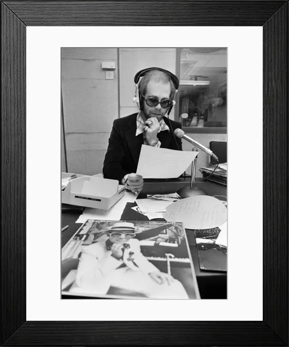 Framed Print : Elton John makes a whistle-stop visit to Birmingham and spends an hour as a disc jockey Framed Print : Elton John makes a whistle-stop visit to Birmingham and spends an hour as a disc jockey