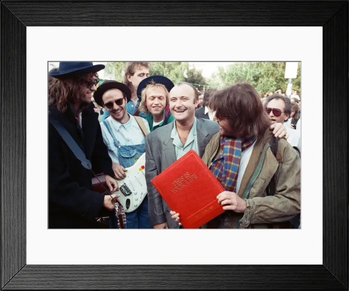 Framed Print : Michael Aspel surprises Phil Collins for the TV show This is your Life Framed Print : Michael Aspel surprises Phil Collins for the TV show This is your Life