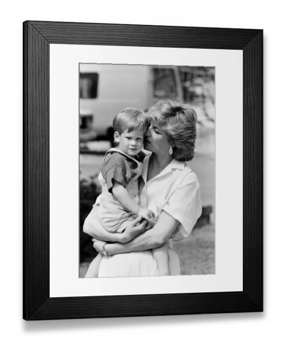 Framed Print : HRH Princess Diana, The Princess of Wales holds her young son Prince Harry on holiday in