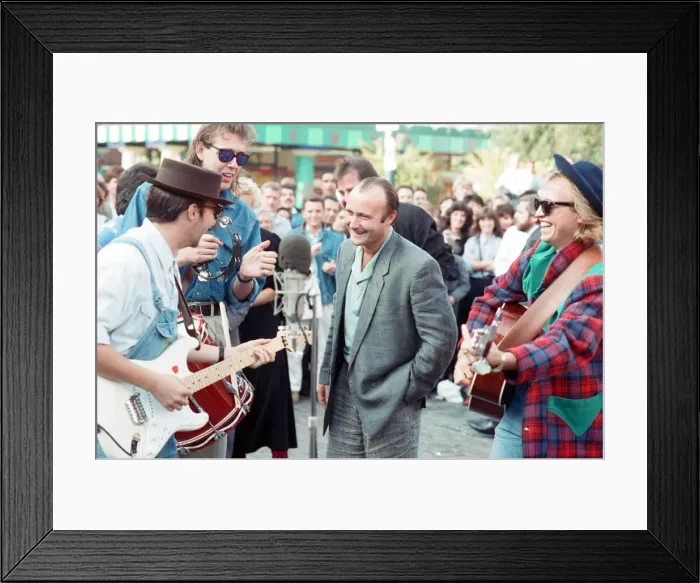 Framed Print : Michael Aspel surprises Phil Collins for the TV show This is your Life Framed Print : Michael Aspel surprises Phil Collins for the TV show This is your Life