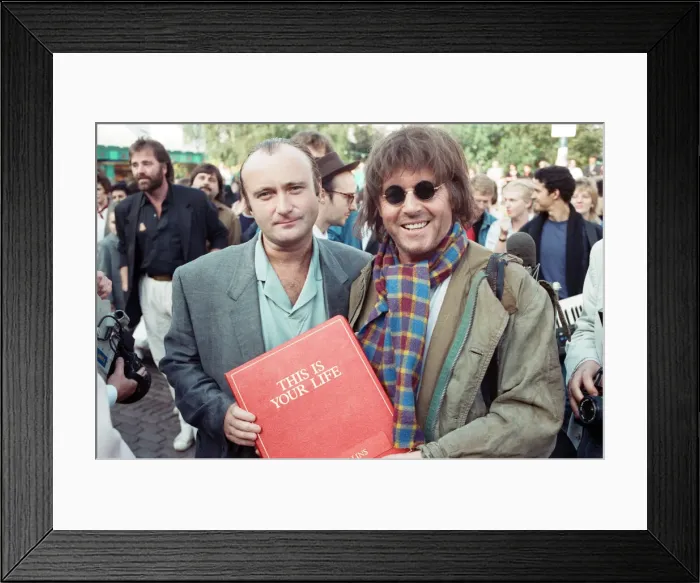 Framed Print : Michael Aspel surprises Phil Collins for the TV show This is your Life Framed Print : Michael Aspel surprises Phil Collins for the TV show This is your Life