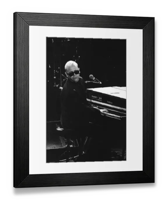 Framed Print : Elton John performing at the Stand by Me: AIDS Day Benefit concert at Wembley Arena Framed Print : Elton John performing at the Stand by Me: AIDS Day Benefit concert at Wembley Arena