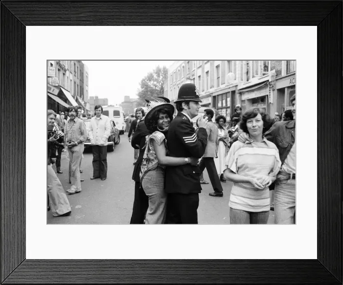 Framed Print : Atmosphere at the Notting Hill Carnival. Twenty-year-old Joanna Edward from Dominica Framed Print : Atmosphere at the Notting Hill Carnival. Twenty-year-old Joanna Edward from Dominica