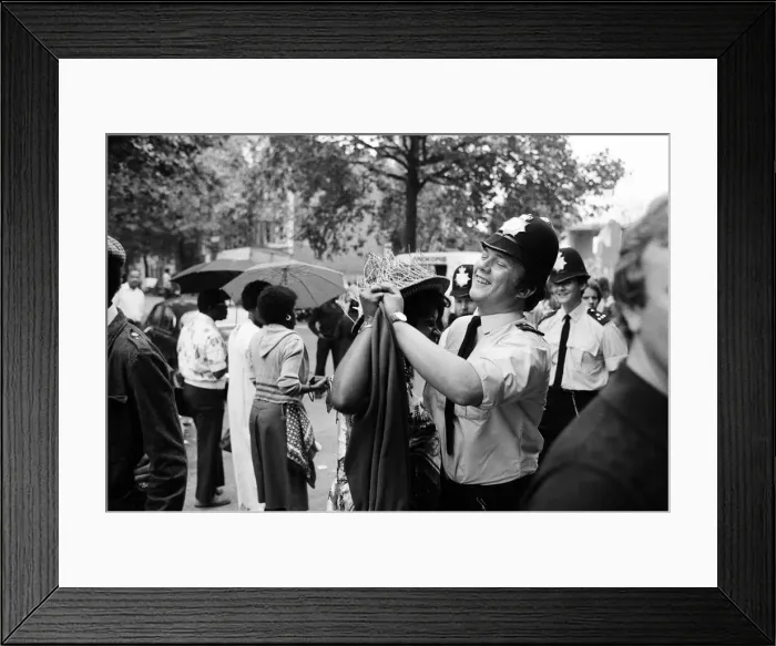 Framed Print : Atmosphere at the Notting Hill Carnival. Twenty-year-old Joanna Edward from Dominica Framed Print : Atmosphere at the Notting Hill Carnival. Twenty-year-old Joanna Edward from Dominica
