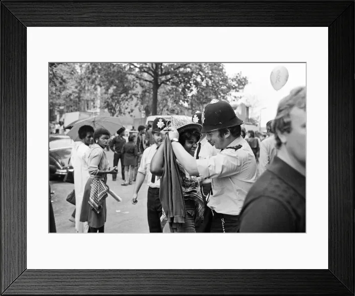 Framed Print : Atmosphere at the Notting Hill Carnival. Twenty-year-old Joanna Edward from Dominica Framed Print : Atmosphere at the Notting Hill Carnival. Twenty-year-old Joanna Edward from Dominica