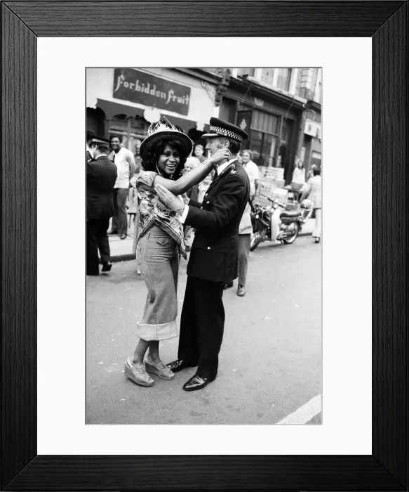 Framed Print : Atmosphere at the Notting Hill Carnival. Twenty-year-old Joanna Edward from Dominica Framed Print : Atmosphere at the Notting Hill Carnival. Twenty-year-old Joanna Edward from Dominica