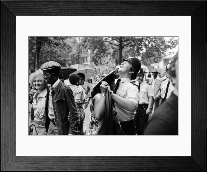 Framed Print : Atmosphere at the Notting Hill Carnival. Twenty-year-old Joanna Edward from Dominica Framed Print : Atmosphere at the Notting Hill Carnival. Twenty-year-old Joanna Edward from Dominica