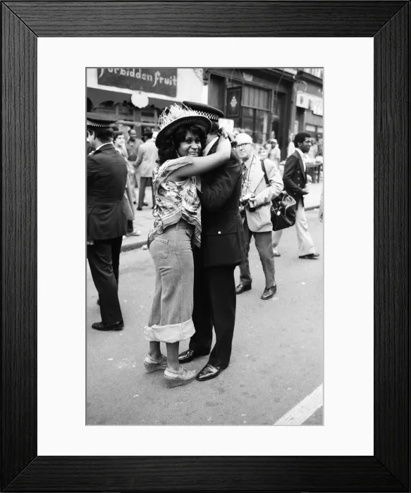 Framed Print : Atmosphere at the Notting Hill Carnival. Twenty-year-old Joanna Edward from Dominica Framed Print : Atmosphere at the Notting Hill Carnival. Twenty-year-old Joanna Edward from Dominica