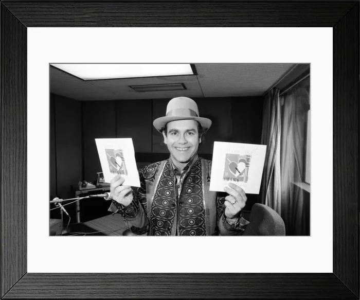 Framed Print : Elton John at BRMB Radio Aston, Birmingham. The visit was to promote his latest single Framed Print : Elton John at BRMB Radio Aston, Birmingham. The visit was to promote his latest single
