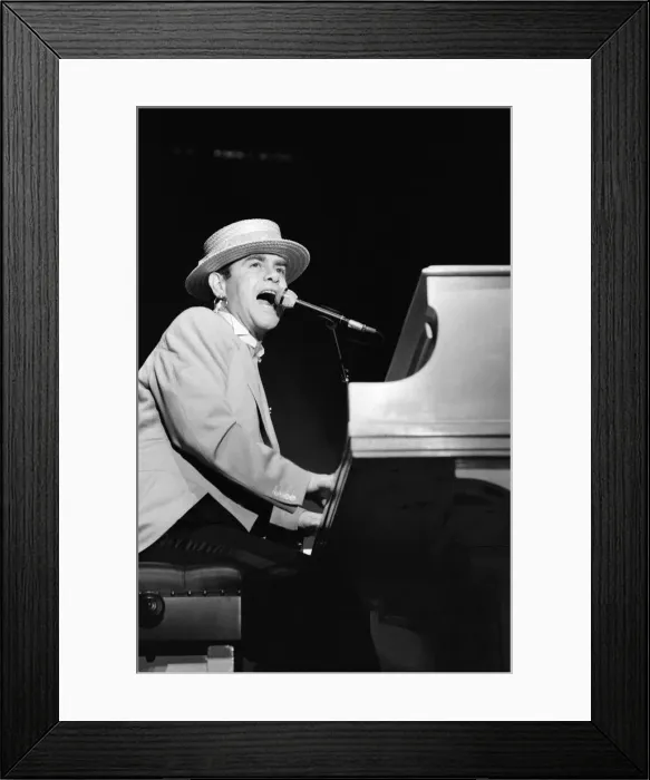 Framed Print : Elton John on his European Express Tour which was the European leg of his 1984 Breaking