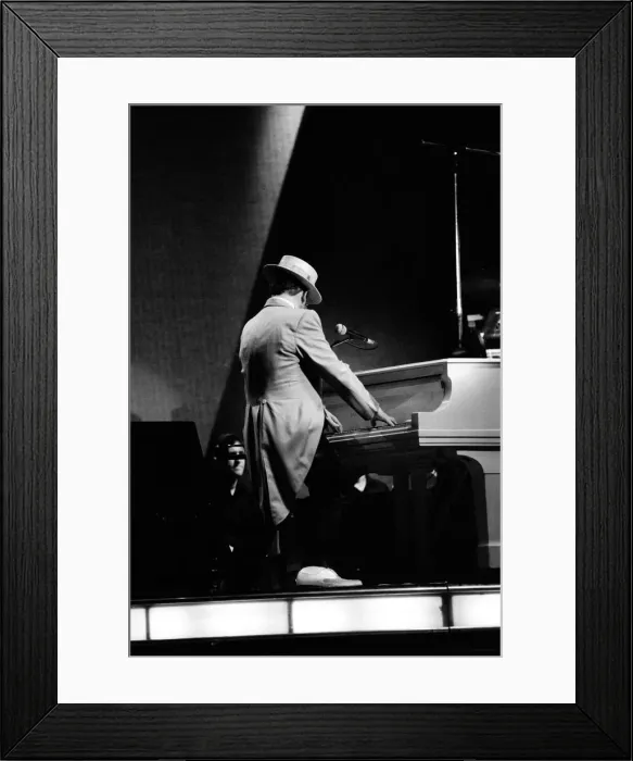 Framed Print : Elton John on his European Express Tour which was the European leg of his 1984 Breaking Framed Print : Elton John on his European Express Tour which was the European leg of his 1984 Breaking