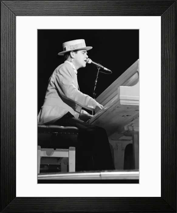 Framed Print : Elton John on his European Express Tour which was the European leg of his 1984 Breaking