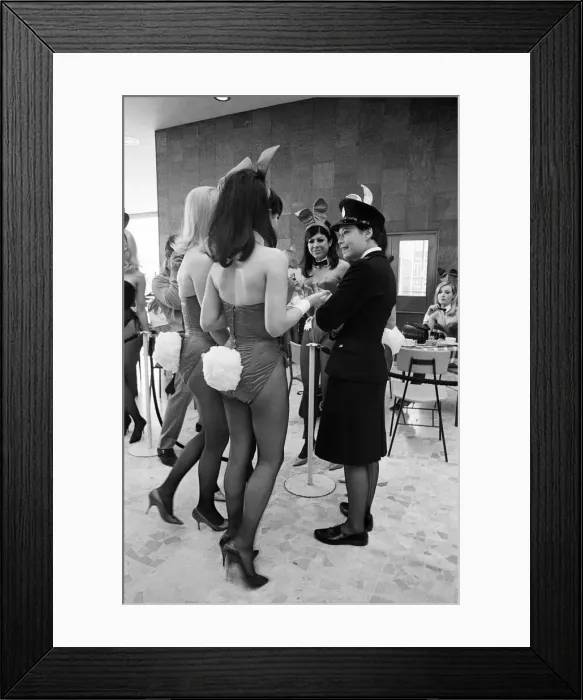 Framed Print : Playboy Bunnies are awaiting the arrival of Hugh Hefner
