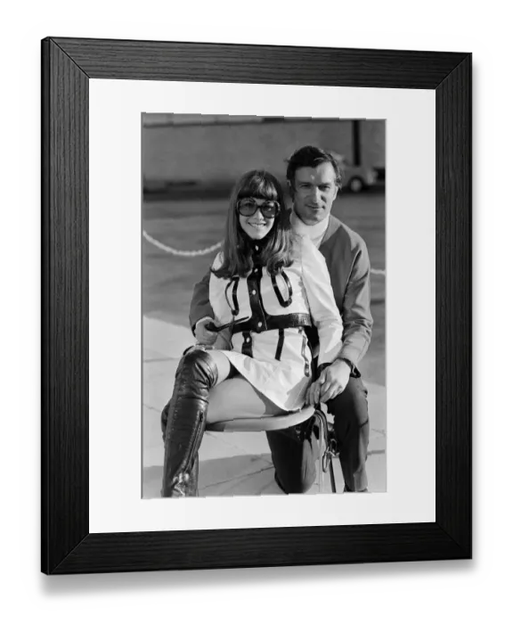 Framed Print : Hugh Hefner arriving at Gatwick Airport with his girlfriend Barbara Benton Framed Print : Hugh Hefner arriving at Gatwick Airport with his girlfriend Barbara Benton