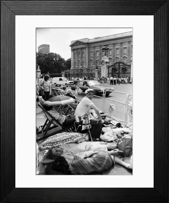Framed Print : Hundreds of would-be Royal watchers started settling down in front of the Victoria Framed Print : Hundreds of would-be Royal watchers started settling down in front of the Victoria