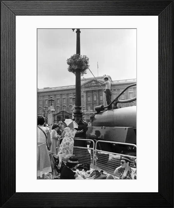 Framed Print : Hundreds of would-be Royal watchers started settling down in front of the Victoria Framed Print : Hundreds of would-be Royal watchers started settling down in front of the Victoria