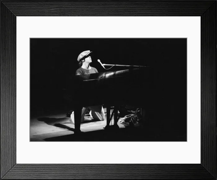 Framed Print : Elton John performing in concert at the Theatre des Champs-Elysees, Paris