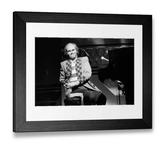 Framed Print : Elton John performing on stage, during the Elton John and Ray Cooper concert tours Framed Print : Elton John performing on stage, during the Elton John and Ray Cooper concert tours