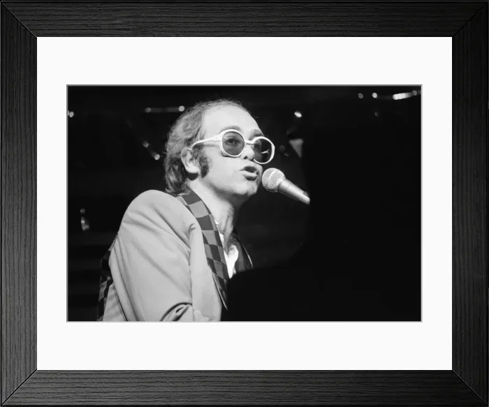 Framed Print : Elton John performing on stage, during the Elton John and Ray Cooper concert tours
