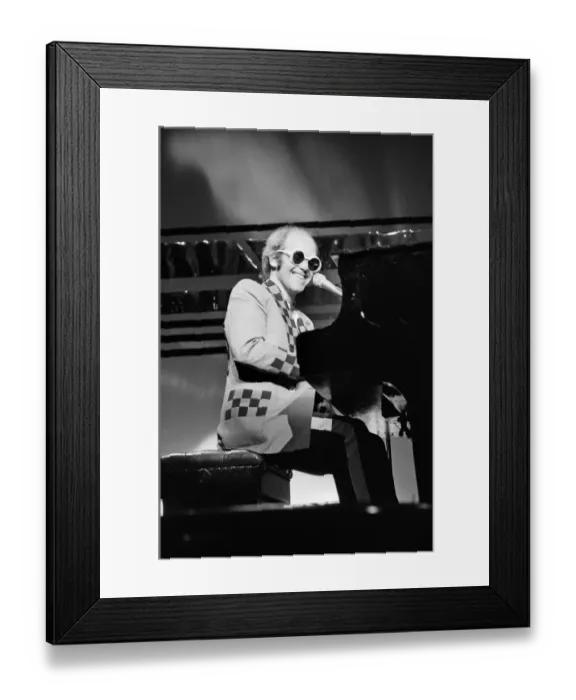 Framed Print : Elton John performing on stage, during the Elton John and Ray Cooper concert tours Framed Print : Elton John performing on stage, during the Elton John and Ray Cooper concert tours