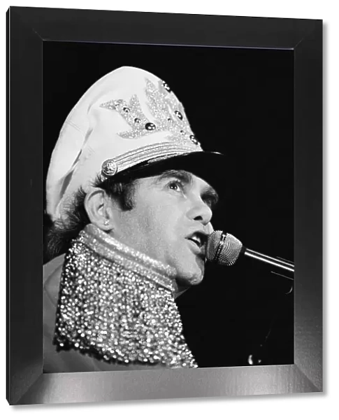Elton John performing in concert at the Birmingham Odeon during his '