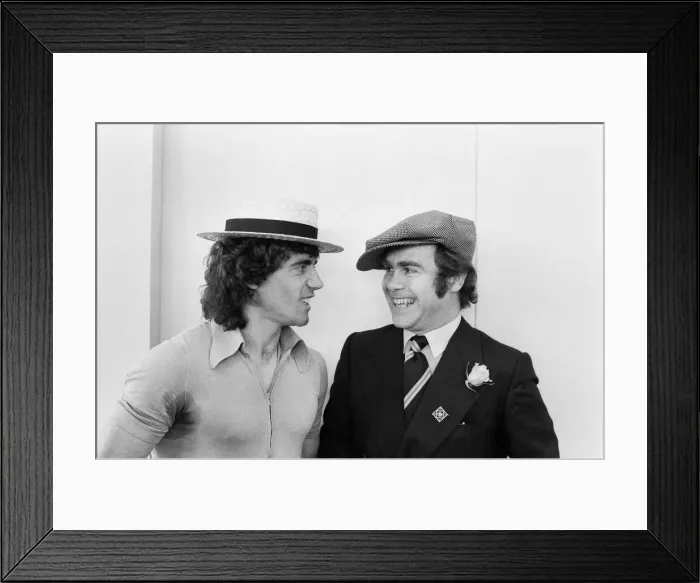 Framed Print : Kevin Keegan in a straw boater hat and Elton John in his own hat