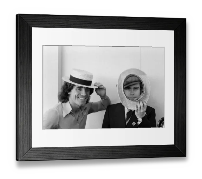 Framed Print : Kevin Keegan in a straw boater hat and Elton John in his own hat
