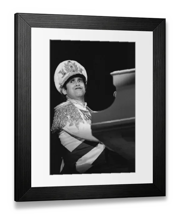 Framed Print : Elton John performing in concert during his Jump Up Tour'. 5th December 1982 Framed Print : Elton John performing in concert during his Jump Up Tour'. 5th December 1982
