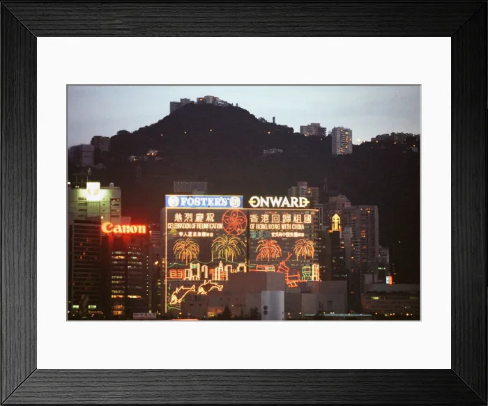 Framed Print : General view of the illuminated skyline at night time in Hong Kong