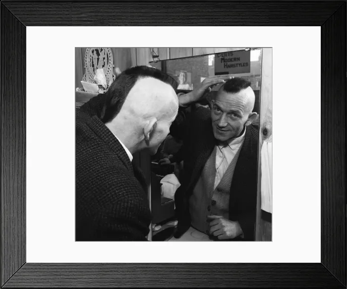 Framed Print : A man having a Mohican haircut in Middlesbrough. Circa 1971 Framed Print : A man having a Mohican haircut in Middlesbrough. Circa 1971