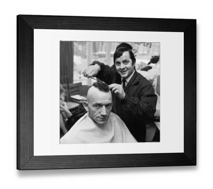 Framed Print : A man having a Mohican haircut in Middlesbrough. Circa 1971 Framed Print : A man having a Mohican haircut in Middlesbrough. Circa 1971