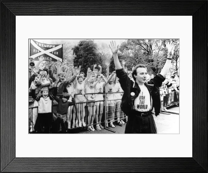 Framed Print : Midge Ure singer pop music infront of runners arms raised at start of race I ran Framed Print : Midge Ure singer pop music infront of runners arms raised at start of race I ran