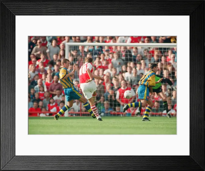 Framed Print : Dennis Bergkamp scores his second goal for his new club Arsenal Framed Print : Dennis Bergkamp scores his second goal for his new club Arsenal