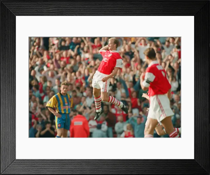 Framed Print : Dennis Bergkamp celebrates his second goal for his new club Arsenal Framed Print : Dennis Bergkamp celebrates his second goal for his new club Arsenal