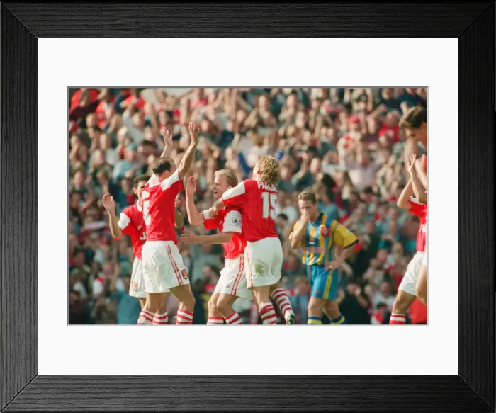 Framed Print : Dennis Bergkamp celebrates his second goal for his new club Arsenal Framed Print : Dennis Bergkamp celebrates his second goal for his new club Arsenal