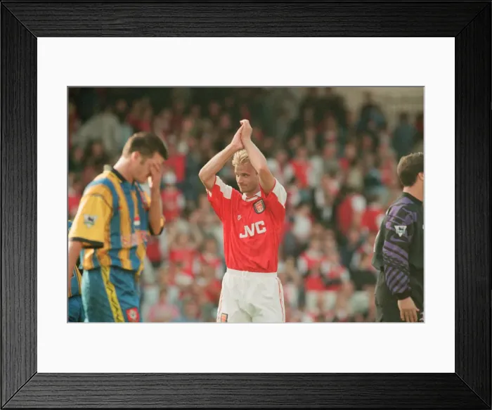 Framed Print : Dennis Bergkamp celebrates and applauds the fans for their support for his teams victory