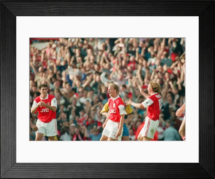 Framed Print : Dennis Bergkamp celebrates his second goal for his new club Arsenal Framed Print : Dennis Bergkamp celebrates his second goal for his new club Arsenal