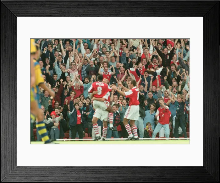 Framed Print : Dennis Bergkamp celebrates his first ever goal for his new club Arsenal Framed Print : Dennis Bergkamp celebrates his first ever goal for his new club Arsenal