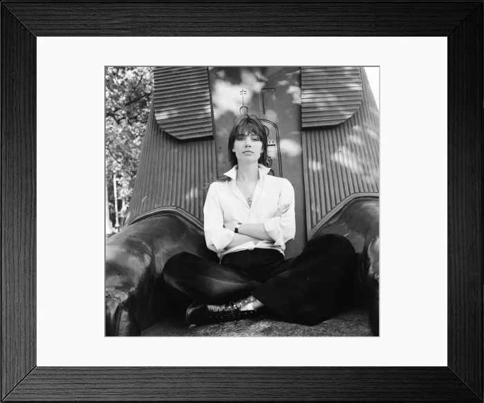 Framed Print : Francoise Hardy, french singer pictured seated between the feet of a sphinx Framed Print : Francoise Hardy, french singer pictured seated between the feet of a sphinx