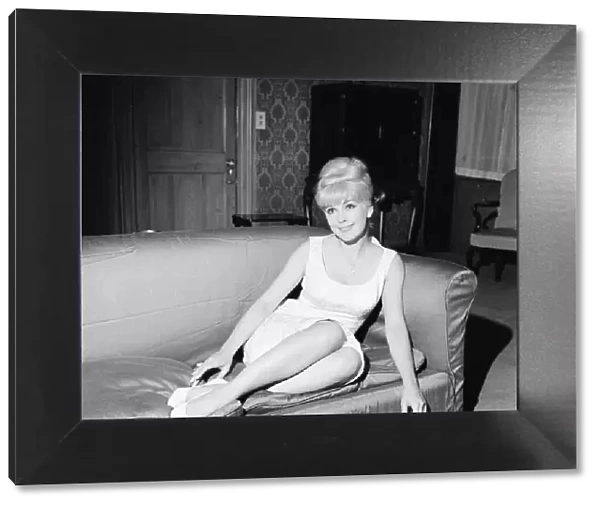 Stella Stevens, American film, television, and stage actress, pictured in hotel suite