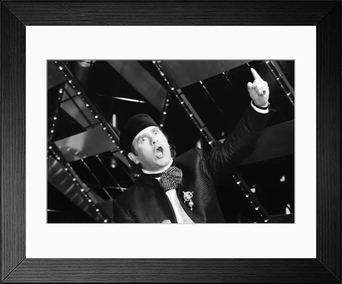 Framed Print : Elton John performing at Montreux Pop Festival. 9th May 1985