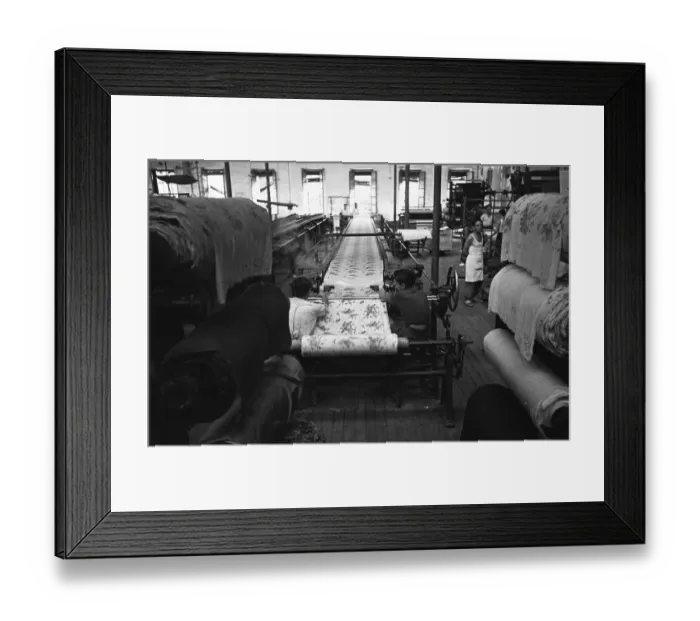 Framed Print : Material is finished and rolled into bolts at an un-named Milan mill. Circa 1955 Framed Print : Material is finished and rolled into bolts at an un-named Milan mill. Circa 1955