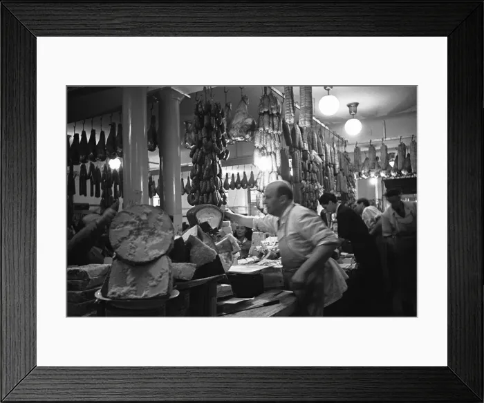 Framed Print : A busy Italian delicatessen shop, Parma, Italy Circa 1955 Framed Print : A busy Italian delicatessen shop, Parma, Italy Circa 1955