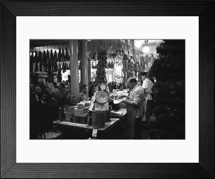 Framed Print : A busy Italian delicatessen shop, Parma, Italy Circa 1955 Framed Print : A busy Italian delicatessen shop, Parma, Italy Circa 1955