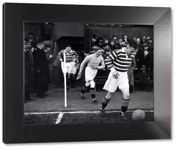 Jock Shaw leads out Rangers in the game against Falkirk at Brockville Park